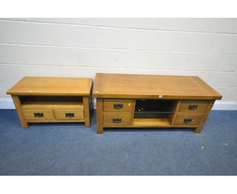 A DARK OAK TV CABINET WITH FOUR DRAWERS, width 131cm x depth 50cm x height 56cm, and a smaller light oak tv cabinet with two 