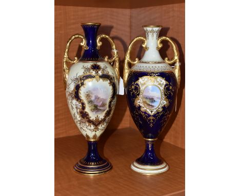 TWO EARLY 20TH CENTURY COALPORTTWIN HANDLED PEDESTAL VASES IN BLUE, PALE YELLOW AND GILT, both lacking covers, hand painted v