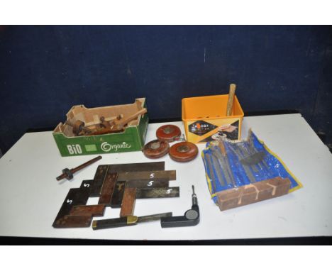 A TRAY CONTAINING CARPENTRY TOOLS including three leather covered Rabone and Rabone and Chesterman tape measures, seven Hardw