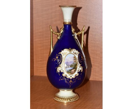 AN EARLY 20TH CENTURY COALPORT TWIN HANDLED BALUSTER VASE, blue, pale yellow and gilt ground hand painted with two oval vigne