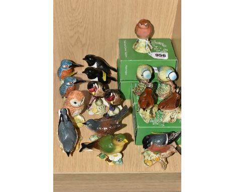 SIXTEEN BESWICK GARDEN BIRDS AND FOUR BOXES, comprising a Robin, model no. 980A with two boxes, two Blue Tit, model no. 992B 