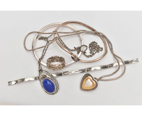 AN ASSORTMENT OF WHITE METAL JEWELLERY, to include two hinged bangles, a signed 'accu.2' bracelet, two necklaces and an open 