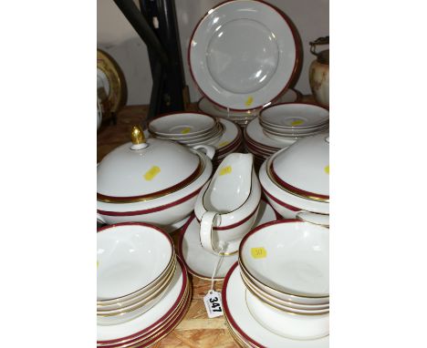 A MINTON 'SATURN' PATTERN DINNER SET, comprising two circular covered tureens, seven dinner plates, sixteen side plates, a gr