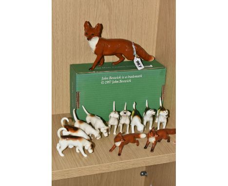 A BOXED BESWICK STANDING FOX, MODEL NO. 1016A, TWO SMALL BESWICK FOXES AND NINE SMALL BESWICK FOXHOUNDS, model nos. 941, 942,