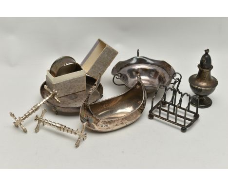 A PARCEL OF SILVER ITEMS, to include two early Victorian knife rests, hallmarked 'John James Keith' London 1840, a nut dish w