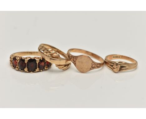 THREE 9CT GOLD RINGS AND A YELLOW METAL RING, the first a yellow gold ring set with five oval cut garnets, hallmarked 9ct Lon