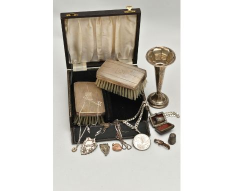 A CASED TWO PIECE SILVER CLOTHES BRUSH SET AND OTHER ITEMS, the black case opens to reveal two silver lined clothes brushes e