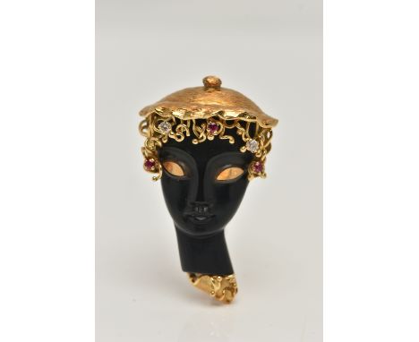 AN 18CT GOLD BLACKAMOOR STYLE BROOCH, depicting a front profile of a lady, set with three small circular cut rubies and two s