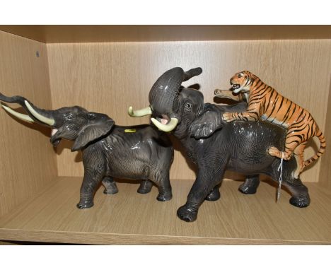 A BESWICK ELEPHANT AND TIGER, MODEL NO. 1720 AND A BESWICK ELEPHANT, MODEL NO. 998, both gloss, tallest height 30.5cm (2) (Co