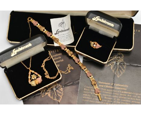 A 'LANDSTROMS' 9CT GOLD SUITE OF JEWELLERY, to include an open work pendant necklace of rose and yellow metal vine leaves and