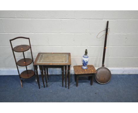 A SELECTION OF OCCASIONAL FURNITURE, to include a leather topped nest of three tables, an Edwardian mahogany three tier cake 