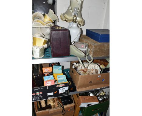 FOUR BOXES OF METALWARE AND SUNDRIES, to include a WW1 Royal Naval Transport Service officer's bullion cap badge, naval brass