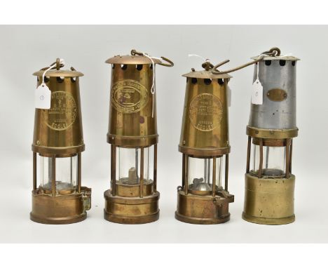 FOUR 20TH CENTURY MINERS LAMPS, comprising two brass Protector Lamp &amp; Lighting Co Ltd Type 6 lamps, a Cadison &amp; Sons 