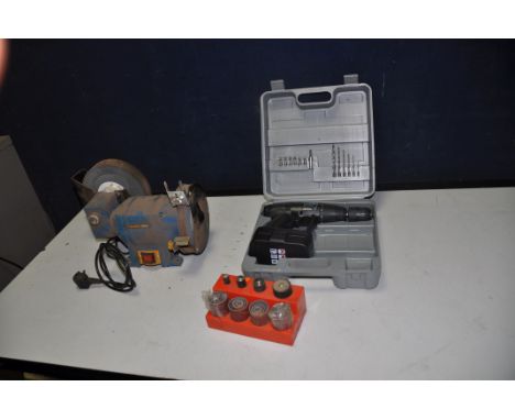 A WORKZONE WET AND DRY BENCH GRINDER (PAT pass and working) a Prima Power cordless drill with one battery but no charger and 