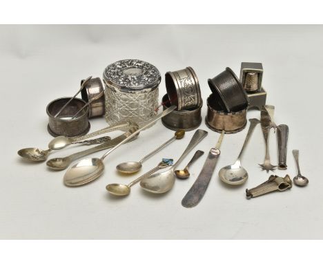 A PARCEL OF SILVER ITEMS, to include six silver napkin rings, each with a full silver hallmark, a glass vanity jar with silve