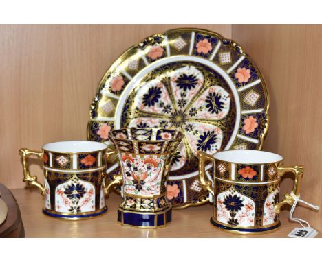 FOUR PIECES OF ROYAL CROWN DERBY IMARI WARES, comprising two 1128 pattern loving cups, a 6299 pattern small footed vase, heig