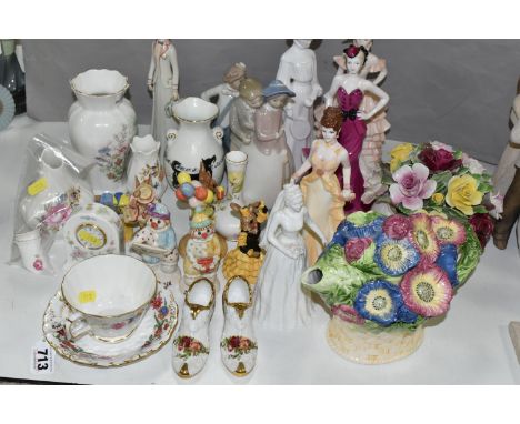 A GROUP OF CERAMIC ORNAMENTS AND FIGURINES, comprising a Royal Crown Derby 'Chatsworth' pattern tea cup and saucer(marked as 