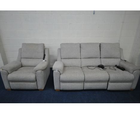 A PARKER KNOLL LIGHT GREY ELECTRIC RECLINING TWO PIECE LOUNGE SUITE, comprising a three seater sofa, and an armchair (conditi