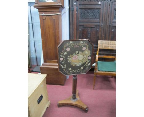 A XIX Century Mahogany Pole Screen, with a tapestry panel, on trifoil base, scroll feet.