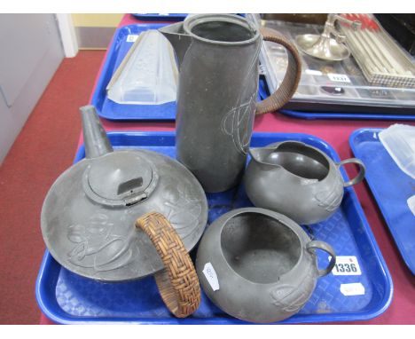 An Early XX Century Art Nouveau Style Pewter Tea Service, (damaged):- One Tray.