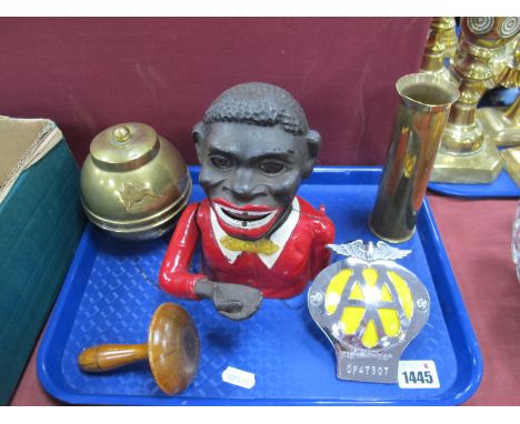 A Jolly Money Bank, Liptons brass 1924 exhibition tea caddy, shell case, AA badge, darning mushroom.