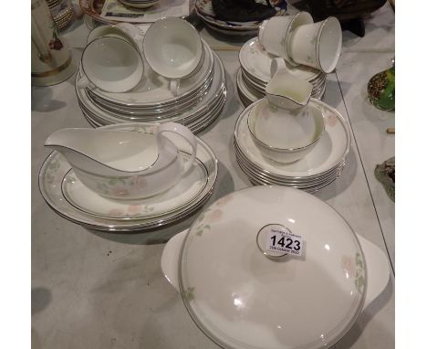 Royal Doulton tea and dinner service in the Twilight Rose pattern, mostly seconds quality. (42) Light use marks but no chips 
