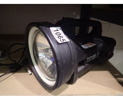 Dragon delta 12 volt rechargeable halogen spot light torch and charger. All electrical items in this lot have been PAT tested