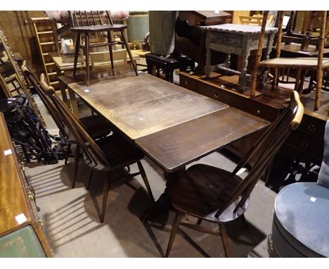 Ercol elm draw leaf dining table with four chairs. Not available for in-house P&amp;P 