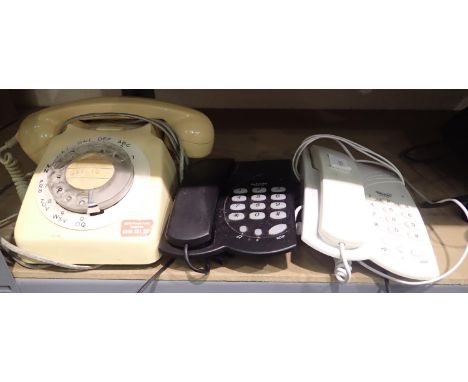 Three telephones including a vintage ivory coloured rotary example. Not available for in-house P&amp;P 