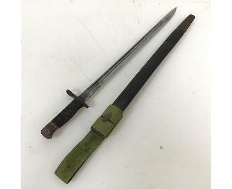 A British pattern 1913 Enfield/Remington bayonet with leather scabbard and canvas frog (58cm)