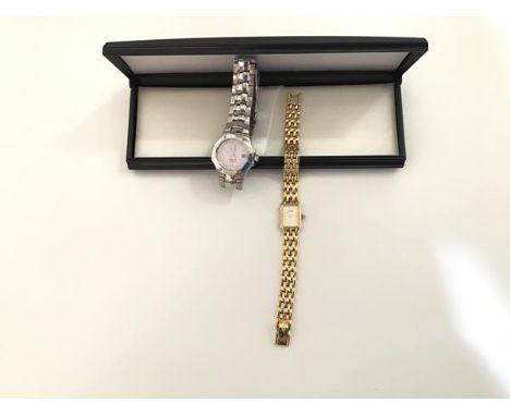 A lady's Rotary yellow metal wristwatch with bracelet strap together with a Seiko white metal lady's wristwatch with pink dia