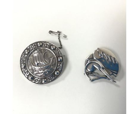A 1950s Glasgow silver badge with Viking ship within a Celtic cross border, complete with safety chain (3.5cm) and a silver b