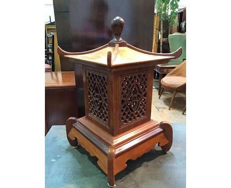 A modern Chinese style wooden table lamp in the form of a Chinese lantern with removable pagoda top over pierced sides and mo