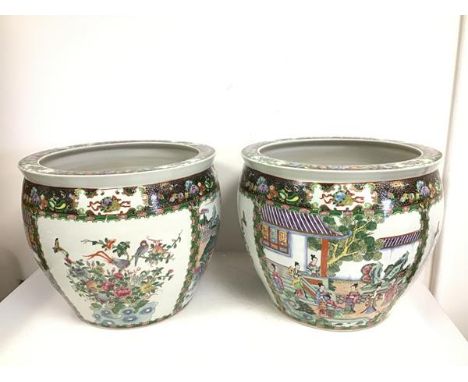 A pair of Chinese goldfish bowls with alternating floral panels and panels depicting Female Figures in a Garden, red seal mar