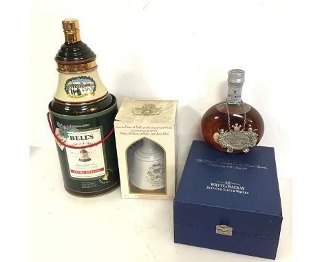 A group of Scotch whiskies including Bells Christmas 1989 (porcelain decanter), White &amp; Mackay, Charles and Diana Royal C