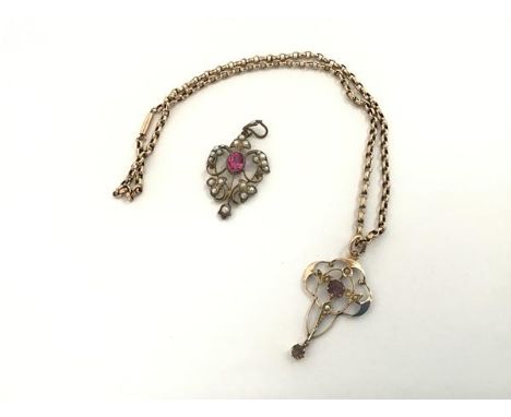A 9ct gold amethyst and seed pearl pendant of Art Nouveau design, on an indistinctly stamped curblink chain with barrel clasp