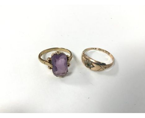 A 9ct gold ring set baguette amethyst (K) and another 9ct gold ring set green stone with surround of six seed pearls (L) (com