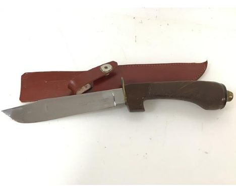 A Wilkinson Sword RJH jungle knife, in original leather scabbard (40cm)