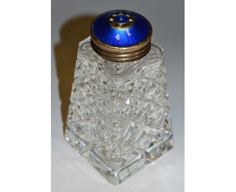 A cut glass shaker, Norwegian silver and blue guilloche enamel lid, Mappin and Webb, London import mark 1973. 12cm high.