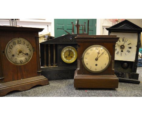 A Fattorini & Sons Ltd Patent Automatic 8 days alarm clock; an oak mantel clock & a Badenia Clock Makers mantel clock; a blac