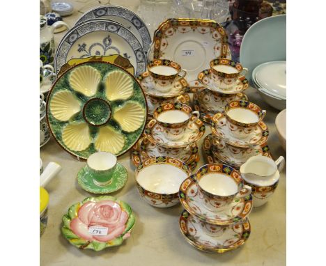 A Royal Albion part tea service comprising teacups & saucers, side plates, sandwich plates, etc.; four Adams blue & white pla