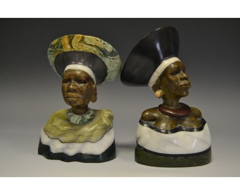 African - a pair of layered hardstone busts of women, signed R. Mhrake
