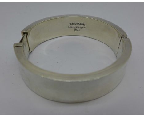 A silver bangle, marked 950 and Laurent Leger, 66g