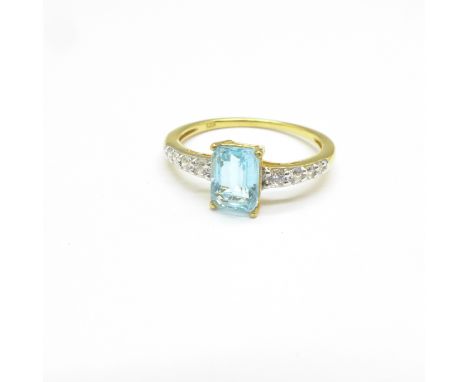 A silver gilt, blue stone and zircon dress ring, T