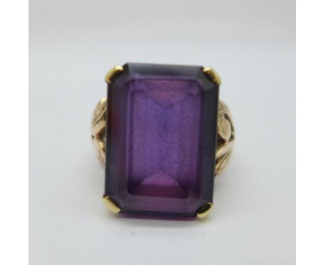 A 9ct gold and purple stone ring, 7.5g, K