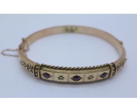 A 9ct gold, diamond and ruby bangle, a/f, 8.7g