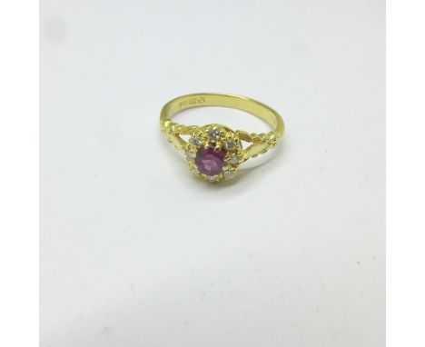 An 18ct gold, diamond and ruby ring, 3.3g, N