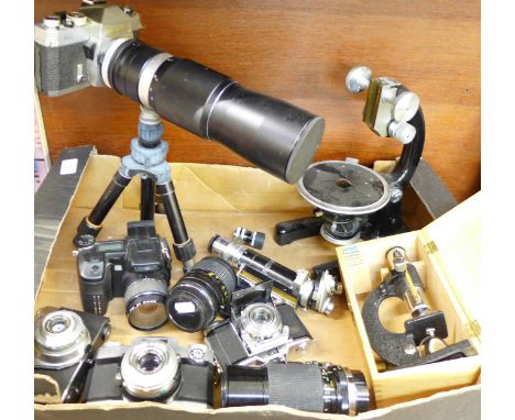 Five cameras, two additional lenses, a J. Swift microscope, a/f, and a smaller microscope