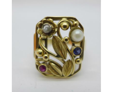 A 14ct gold, Art Nouveau old cut diamond, sapphire, ruby and pearl set ring, shank marked 585, 6.7g, P, 20mm x 15mm