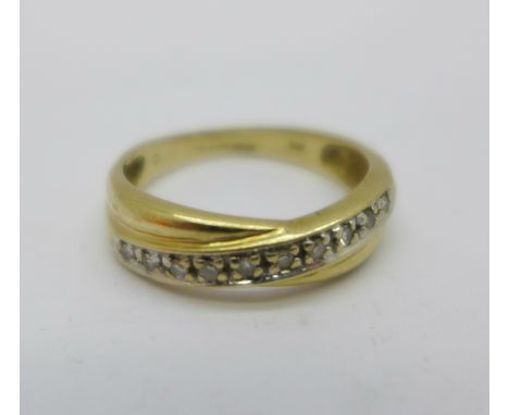 A 9ct gold and diamond ring, 1.9g, K